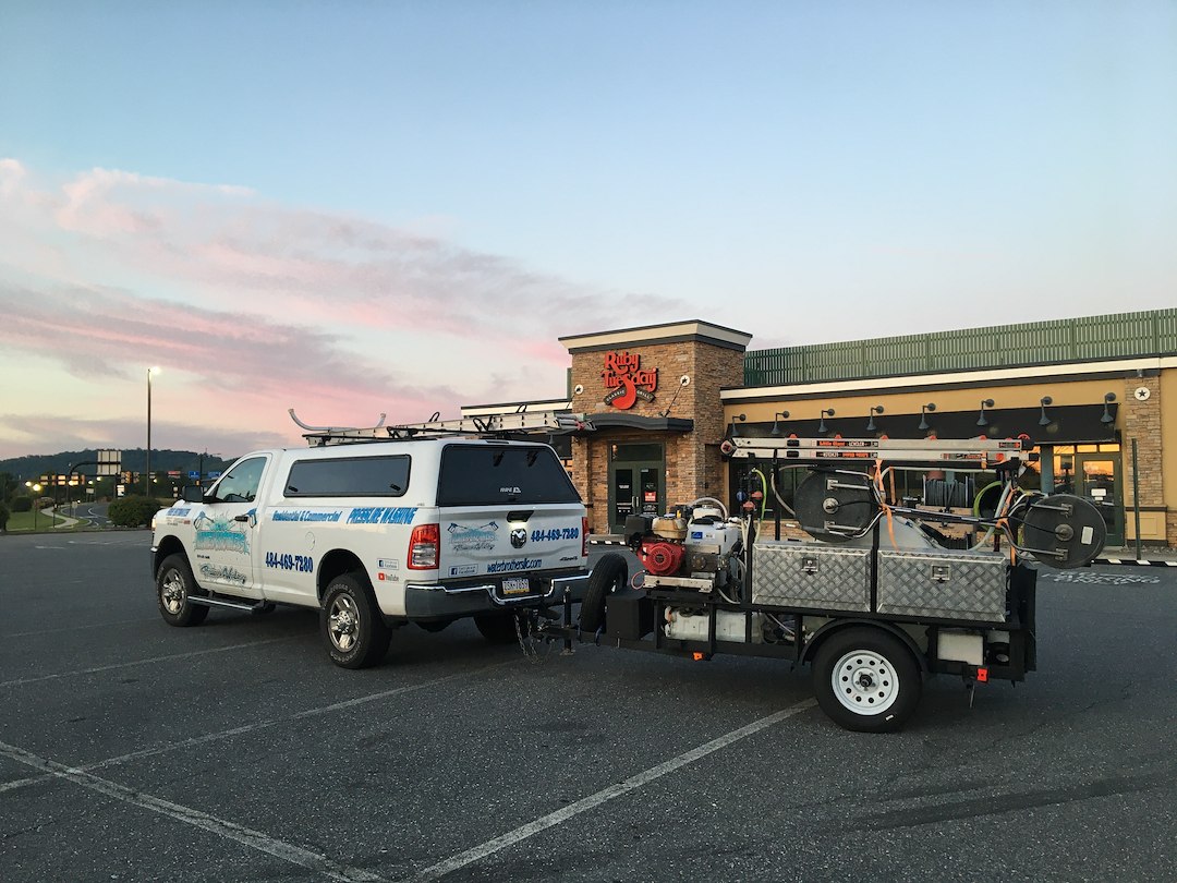 Water Brothers Pressure Washing Tackles Tough store front Cleaning and dumpster pad cleaning Challenge in Bethlehem, PA